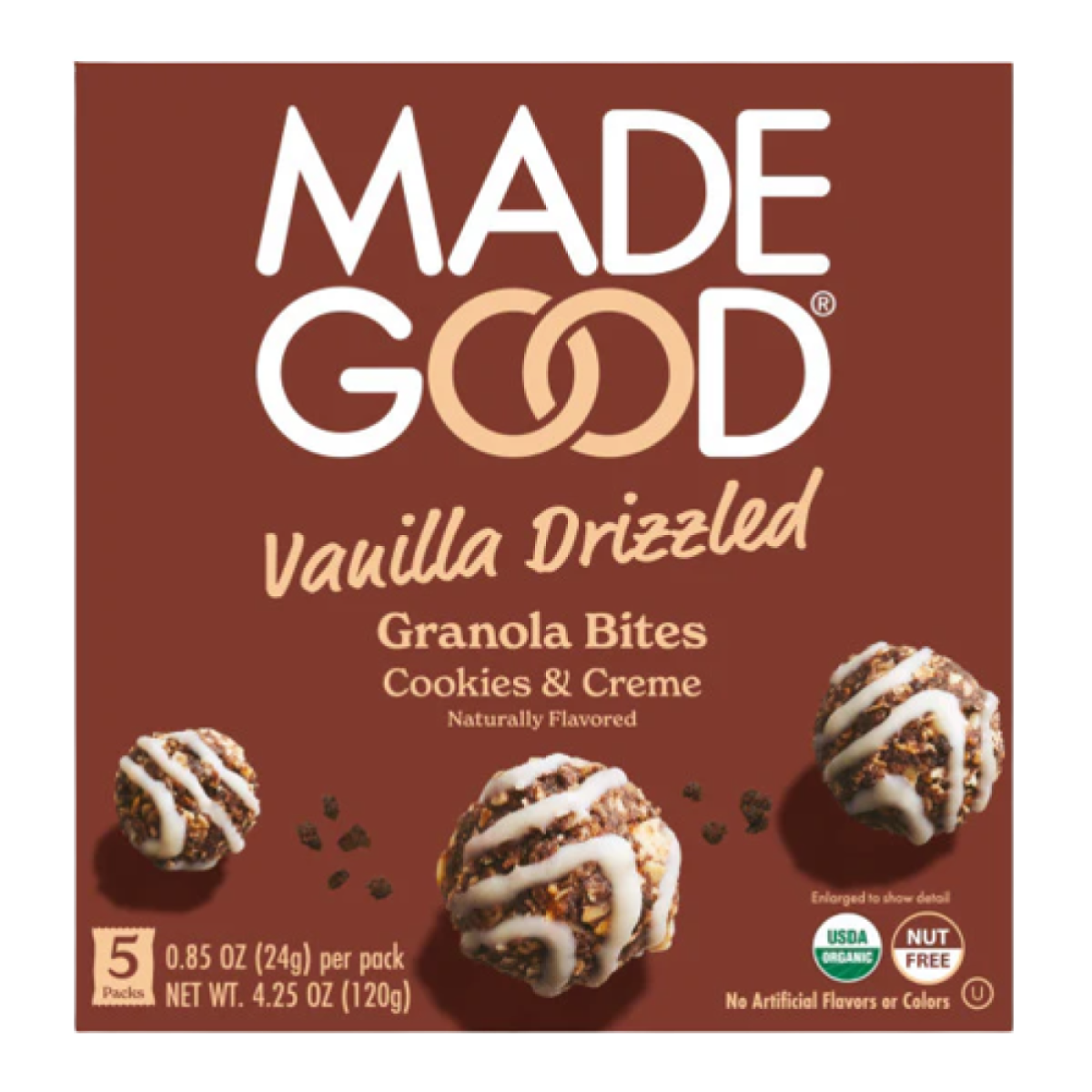 Packaging for Made Good Vanilla Drizzled Granola Bites, Cookies & Creme flavor. Brown background with images of drizzled granola balls and organic labels.