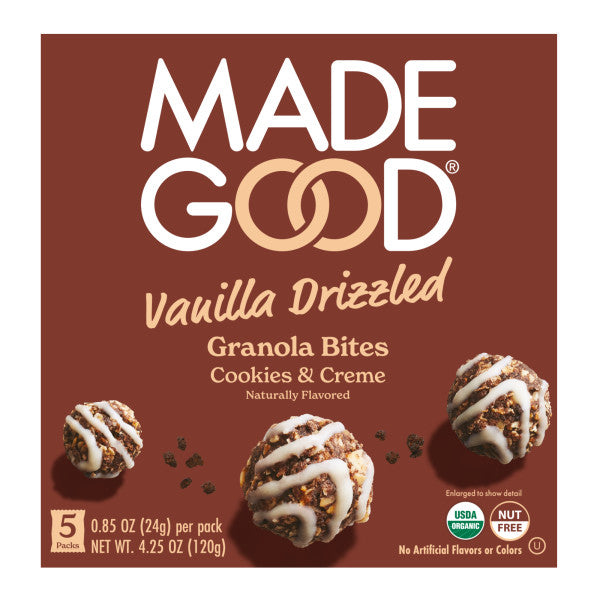 a box of madegood vanilla drizzled granola bites in cookies & creme flavor