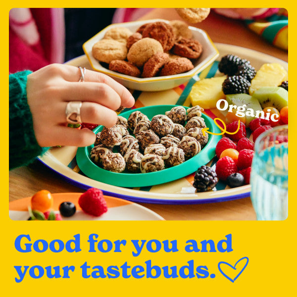 Good for you and your tastebuds: someone holding a platter with cookies stacked like a pyramid